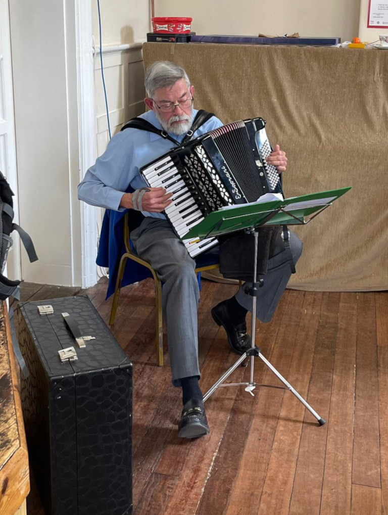 Richard playing his accordian