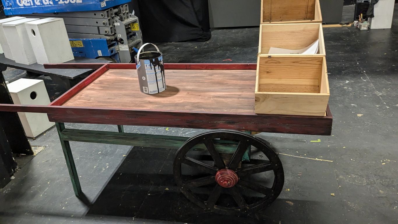 Costermonger's barrow.