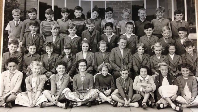 Miss Cross’s class 1959. I’m on the far right on the second row up.