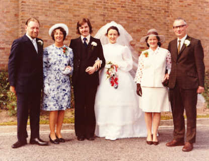 Outside the church with both sets of parents.